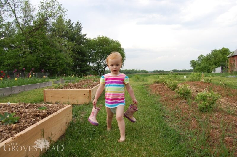 Elsie helping in the garden