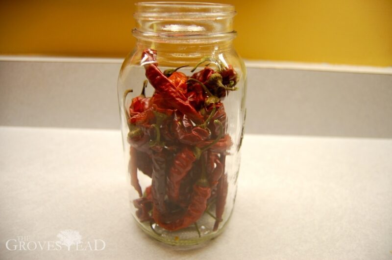 Dehydrated cayenne peppers placed in mason jar