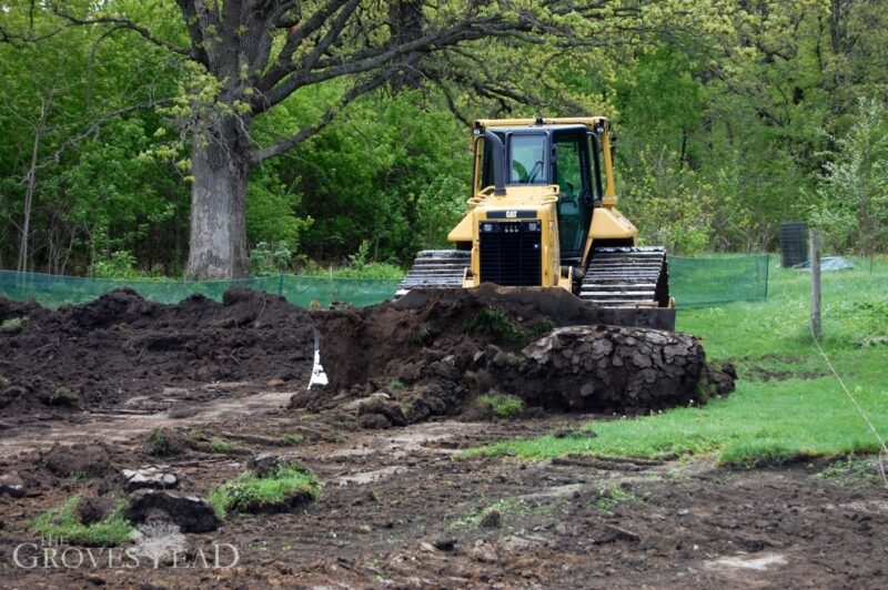 Bull dozer pushing dirt