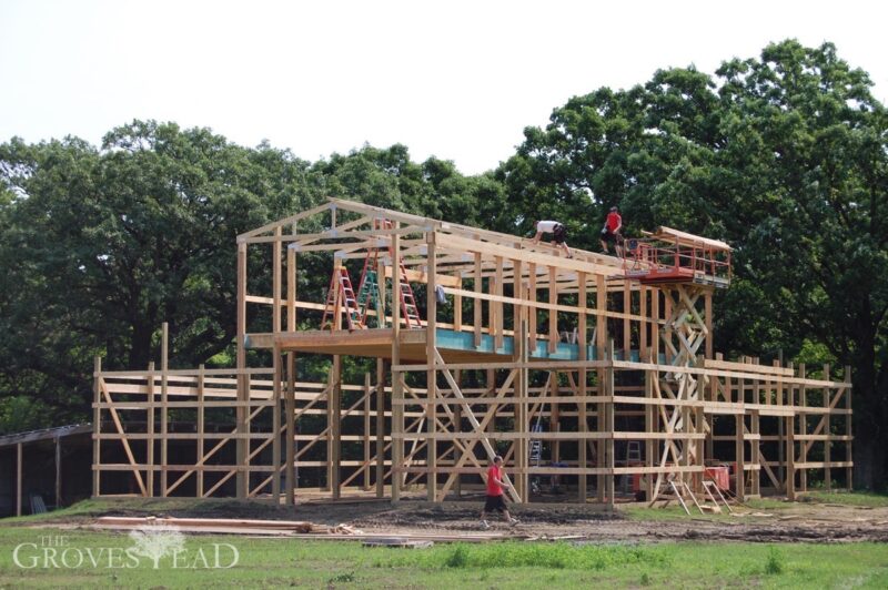 Workers building the roof