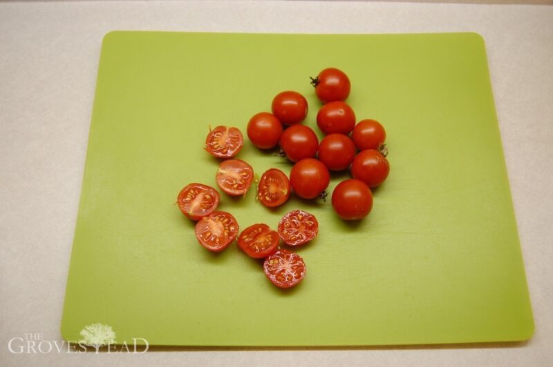 Cutting the tomatoes to save seed