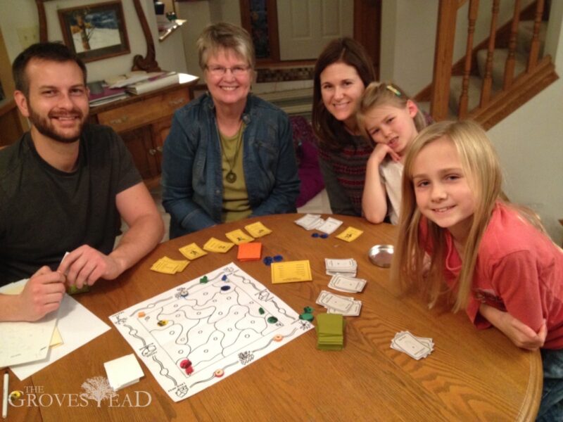 Grandma, sister, and nieces help test out the game board ideas
