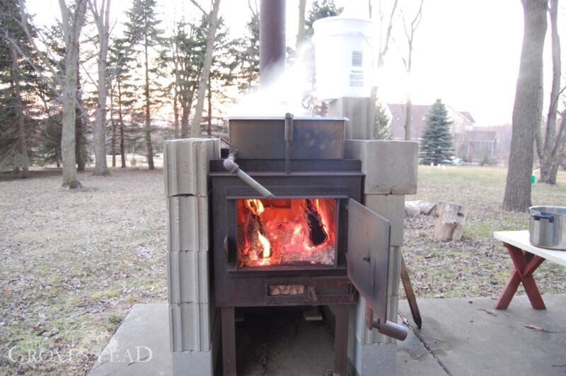 Evaporating sap over a hot fire